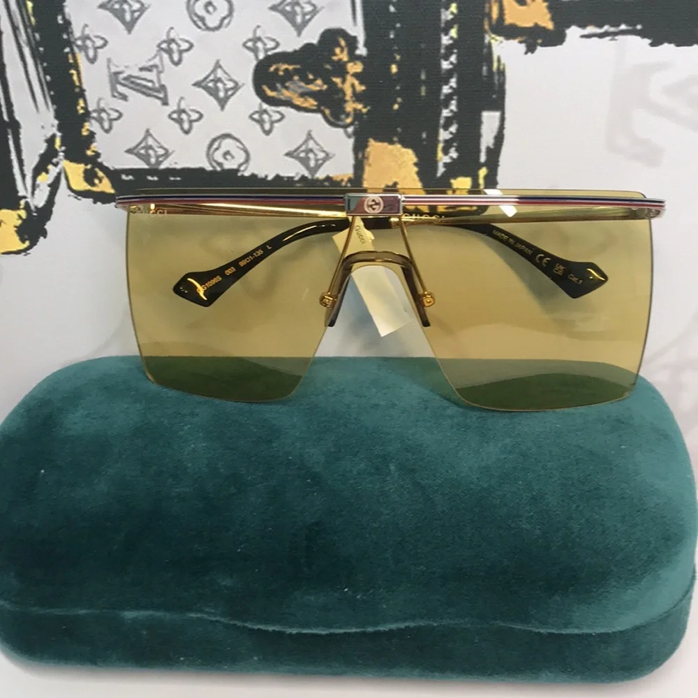 New Authentic GG1096S 003 Sunglasses by Gucci™ Shield, Material: Metal, Rimless.